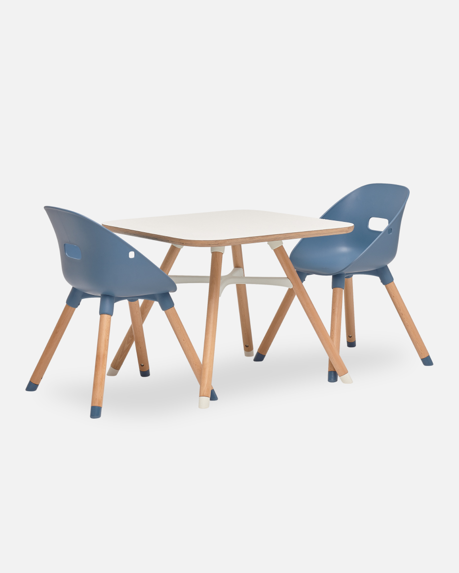 The Play Kit in Blueberry — a small wooden table with two scoop-back chairs